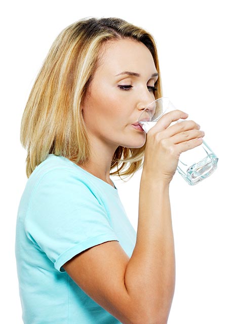 young woman drinks water